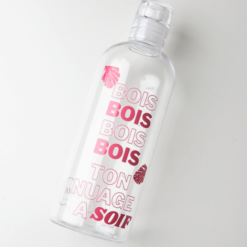 Gourde graduée de 750 ml avec message motivant en rose, idéale pour l'hydratation au quotidien.