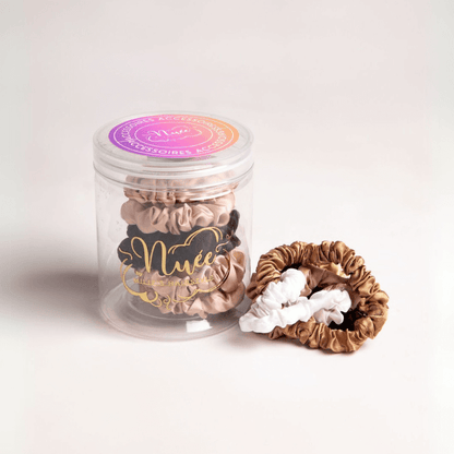 Kit SHRINKY avec 6 chouchous en satin pour étirer des cheveux sans chaleur et maintenir les boucles.